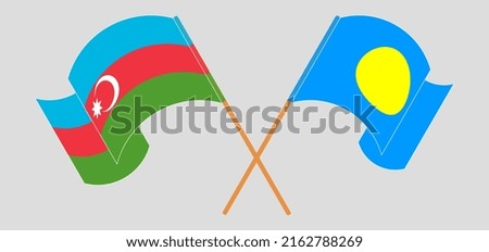 Crossed and waving flags of Azerbaijan and Palau. Vector illustration
