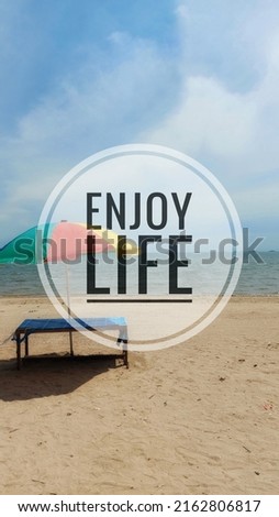 Inspirational motivational quotes. enjoy life with the background of beach (full size)