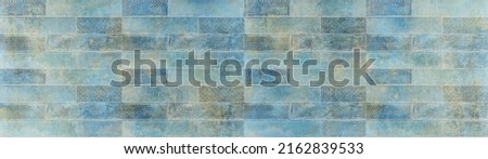 Old blue turquoise aquamarine colored vintage worn geometric shabby mosaic ornate patchwork motif porcelain stoneware tiles stone concrete cement wall texture background panorama Royalty-Free Stock Photo #2162839533