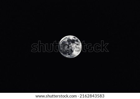 Full moon against a black sky