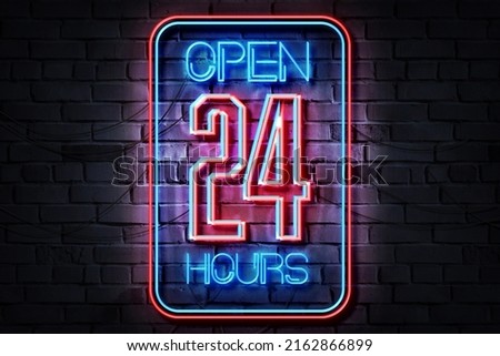 Open 24 hours  Neon Sign on a dark wall