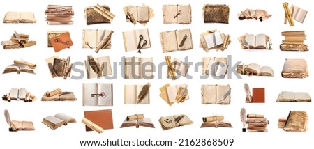 Set of many old books and scrolls isolated on white Royalty-Free Stock Photo #2162868509