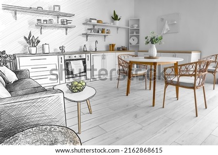 New interior of stylish kitchen with dining table and sofa