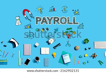 Payroll with collection of electronic gadgets and office supplies