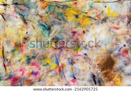 Abstract colored background made with a painter rug. Cool tones.