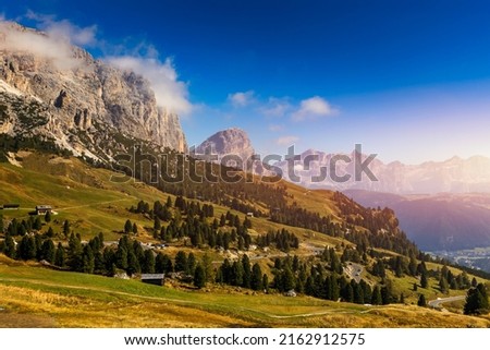Gardena Pass, Trentino Alto Adige, Italy. Gardena Pass with Sassolungo mountain on the background. Passo Gardena, alpine pass between Val Badia and Val Gardena, South Tyrol, Italy. Royalty-Free Stock Photo #2162912575