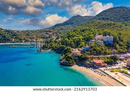 Aerial view of city of Poros, Kefalonia island in Greece. Poros city in middle of the day. Cephalonia or Kefalonia island, Ionian Sea, Greece. Poros village, Kefalonia island, Ionian islands, Greece. Royalty-Free Stock Photo #2162913703