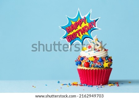 Celebration birthday cupcake with superhero happy birthday cake pick Royalty-Free Stock Photo #2162949703