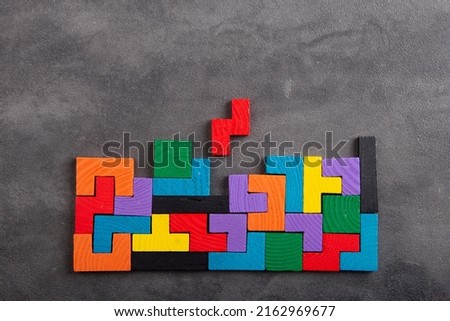 Creative idea solution - business concept, jigsaw puzzle close up. Leadership and teamwork strategy success. Royalty-Free Stock Photo #2162969677