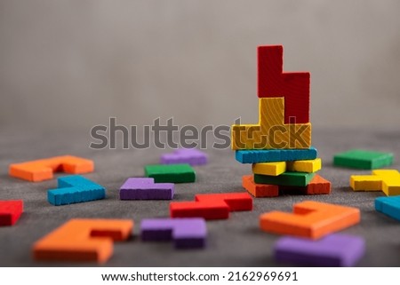 Creative idea solution - business concept, jigsaw puzzle close up. Leadership and teamwork strategy success. Royalty-Free Stock Photo #2162969691