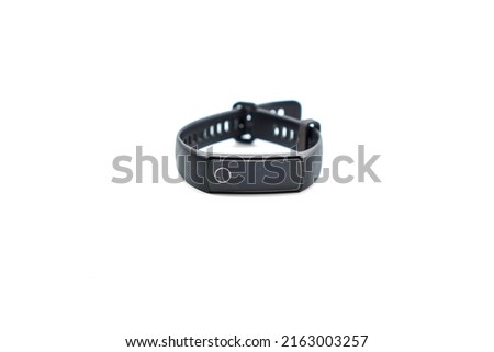 black digital smart fitness watch bracelet with touch screen isolated on a white background
