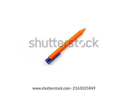 orange and blue plastic pen isolated on white background Royalty-Free Stock Photo #2163025849