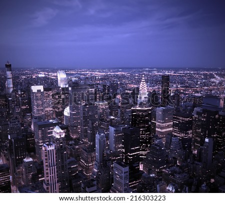 Aerial view of the New York City Skyline at sunset with a blue hue