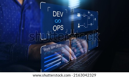 DevOps software development IT operation engineer work with agile gestures as programer development concept with dev and ops icon computer screen project manager operation sysadmin typing on keyboard Royalty-Free Stock Photo #2163042329