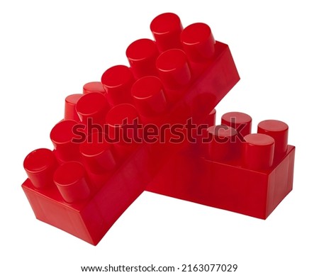 Plastic red cubes toy blocks isolated on white background. Toys and games. Leisure and rest.Detail for Design. design elements. macro. full focus. Background for Business Cards, PostCards and Posters.