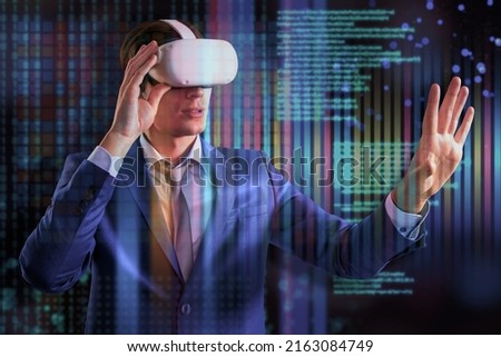 Attractive young european businessman with VR glasses standing on abstract glitching background with coding and tech information. Database, html language and science concept. Double exposure