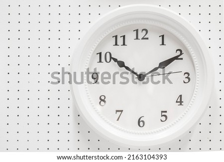white round wall clock photo