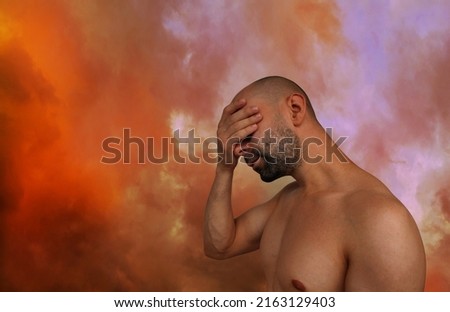 blurred background, orange sky with dark clouds, heat wave concept, global warming problem, natural disasters, physical well-being of people, meteorological dependence
