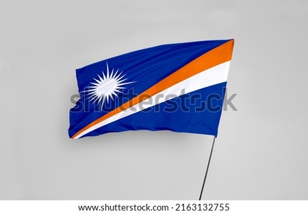The Marshall Islands flag is isolated on a white background with a clipping path. flag symbols of Marshall Islands. flag frame with empty space for your text.