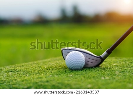 Golf balls on the golf course with golf clubs ready for golf in the first short. In the morning, with the beautiful sunlight.                                 Royalty-Free Stock Photo #2163143537