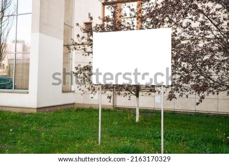 Billboard canvas mockup in city background. Poster sign mockup stand.