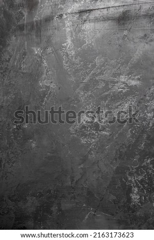 vintage textured dark gray stucco wall background with scratches, scuffs and stains. abstract plaster backdrop for copy space Royalty-Free Stock Photo #2163173623