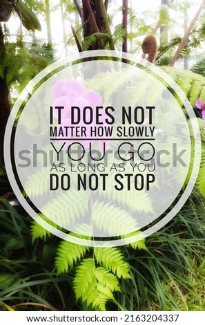 inspirational motivated quote,  It does not matter how slowly you go as long as you do not stop in nature background 