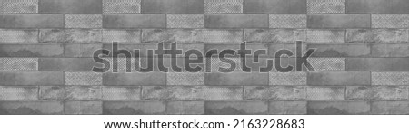 Old gray greyvintage worn geometric shabby mosaic ornate patchwork motif porcelain stoneware tiles stone concrete cement wall texture background banner panorama	 Royalty-Free Stock Photo #2163228683