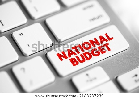 National Budget - document prepared by the government presenting its anticipated tax revenues and proposed expenditure for the coming financial year, text concept button on keyboard