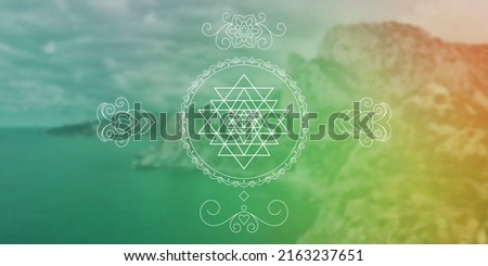 Sacred geometry zentangle inspired design template with oriental tribal ornaments. Geometric ornamental new age art.  Sri Yantra symbol in front of outer space background.
 Royalty-Free Stock Photo #2163237651