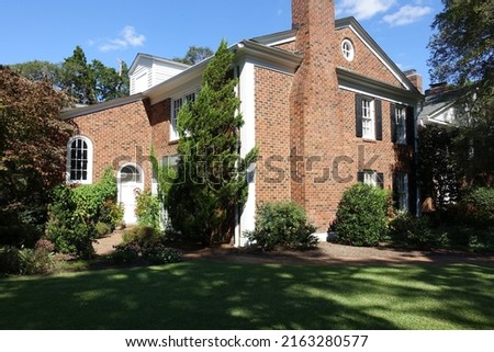 Beautiful Brick Home in a Pinehurst, North Carolina neighborhood Royalty-Free Stock Photo #2163280577