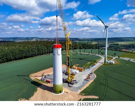 Construction of a new wind turbine for wind energy Royalty-Free Stock Photo #2163281777