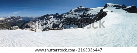 Ski tour below mount clairden. High-altitude ski tour in the Swiss mountains. High quality photo. Panorama picture.