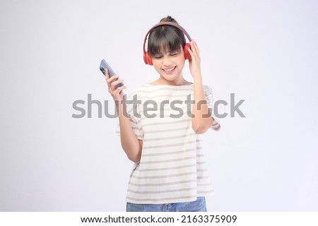 A young beautiful woman wearing headset on white background