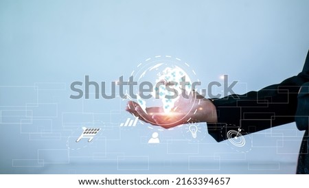 Hand of a business woman holding a virtual model world.stock market. Business invest in trading. Businessman analyzing data icon business and network.Stock Market Investments Funds .