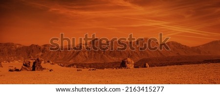 Martian Mountains of the Desert Landscape of the Planet Mars. Image of a Landscape similar to Mars Royalty-Free Stock Photo #2163415277