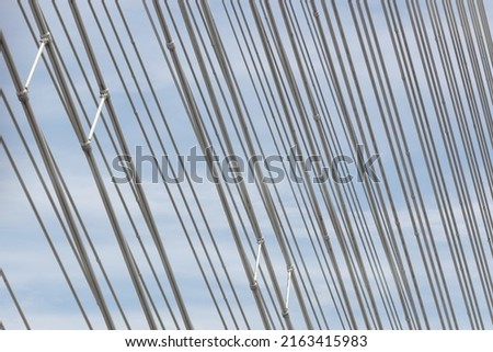  Steel ropes, close up in the afternoon. Bridge support. High quality photo