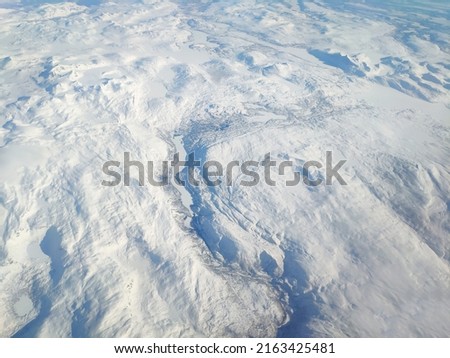 Aerial view of nature white snow covered the land in winter, Snowscape wallpaper