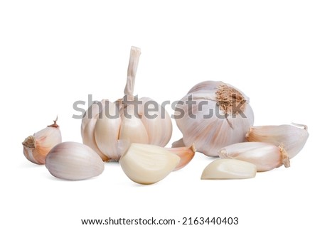 Isolated garlic. Fresh peeled garlic cloves, bulb  with garlic slices isolated on white background. clipping path.
