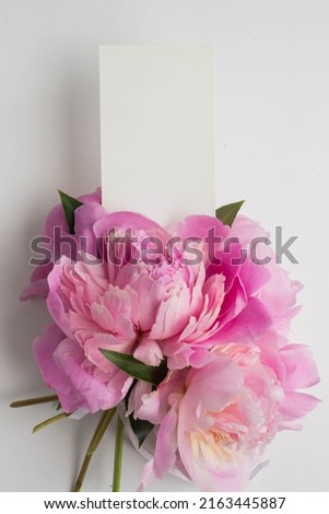 card mockup with pink peonies and water drops