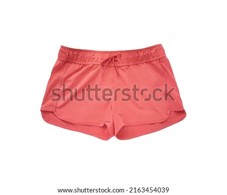 Top view of red sports shorts for beach or running isolated on white background