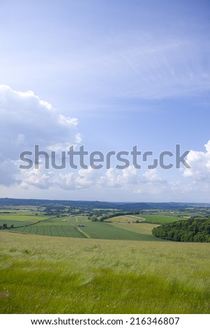 Clouds in blue sky over countryside