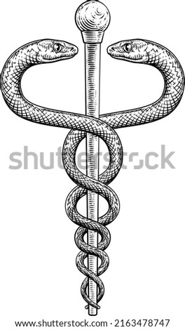 A caduceus doctor medical snakes symbol in a vintage engraved retro style