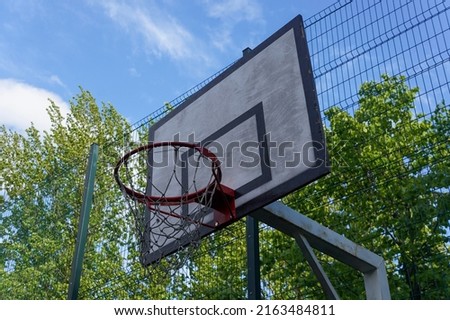Basketball hoop in a plaground in the public park
