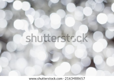 Christmas garland, festive background with white lights.