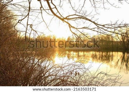 Regensburg, Germany:  Panorama of sunset at the lake