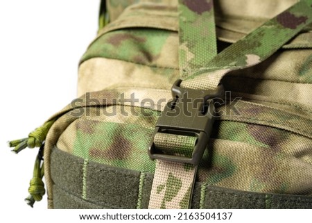 Close up photo still life  of a green army tactical backpack