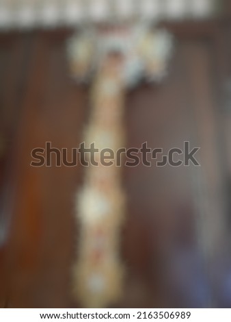 Defocused or blurred abstract background of a balinese traditional wooden mask called "Tapel Rangda" in Balinese