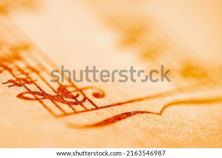 Close up treble clef and music notes. Macro image. Copy space.