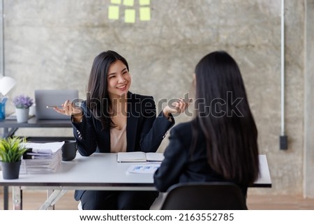 Team of Asian Businessman working at office with documents on his desk, doing planning analyzing the financial report, business plan investment, finance analysis concept
